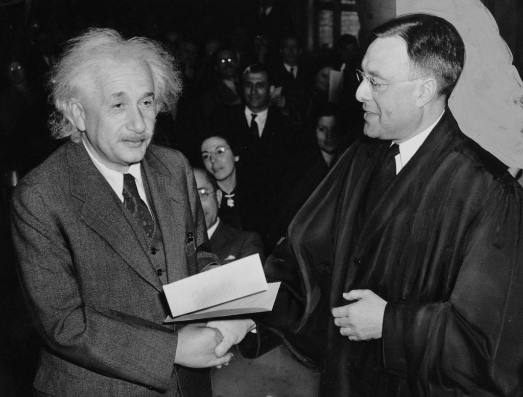 Photo of Albert Einstein, theoretical physicist receiving an award