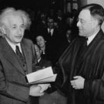 Photo of Albert Einstein, theoretical physicist receiving an award
