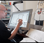 Photo of cartoonist Scott Adams, drawing his famous cartoon strip, "Dilbert"