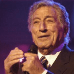 Musician Tony Bennett performing on stage